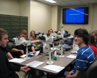 Students using the Pathology lab teaching microscopes